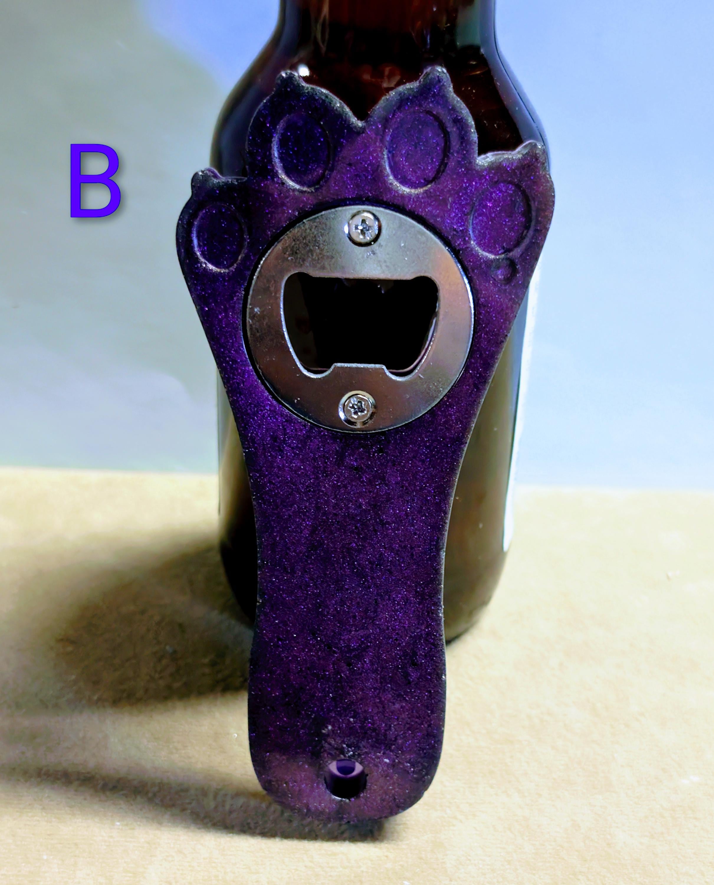 Paw print bottle openers many other colors available.  Also available with magnet on back.