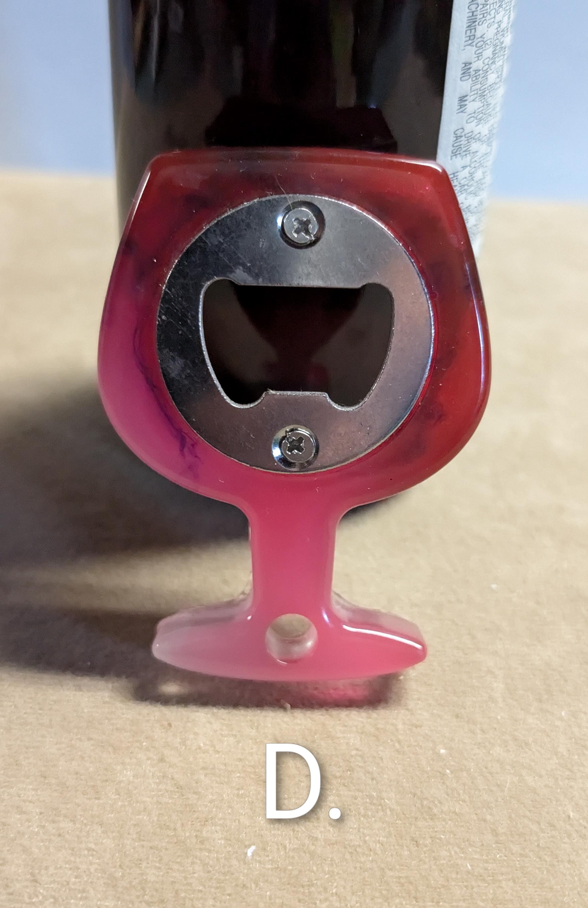 Wine glass shaped bottle opener. Many colors available.