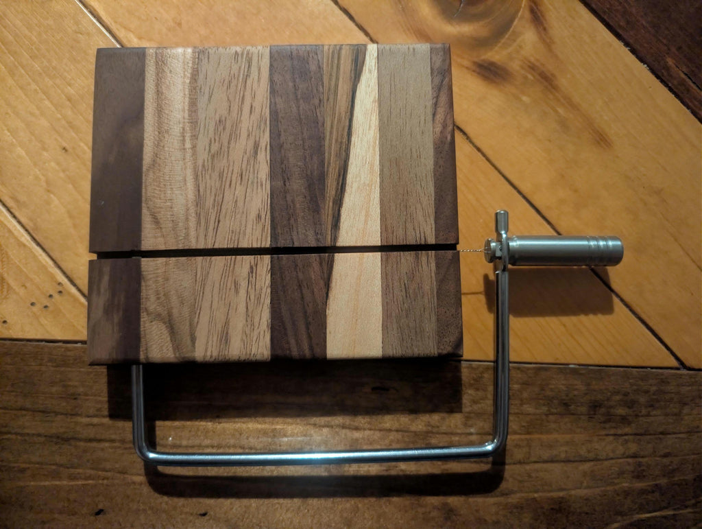 Farmhouse style cheese cutter made of exotic wood