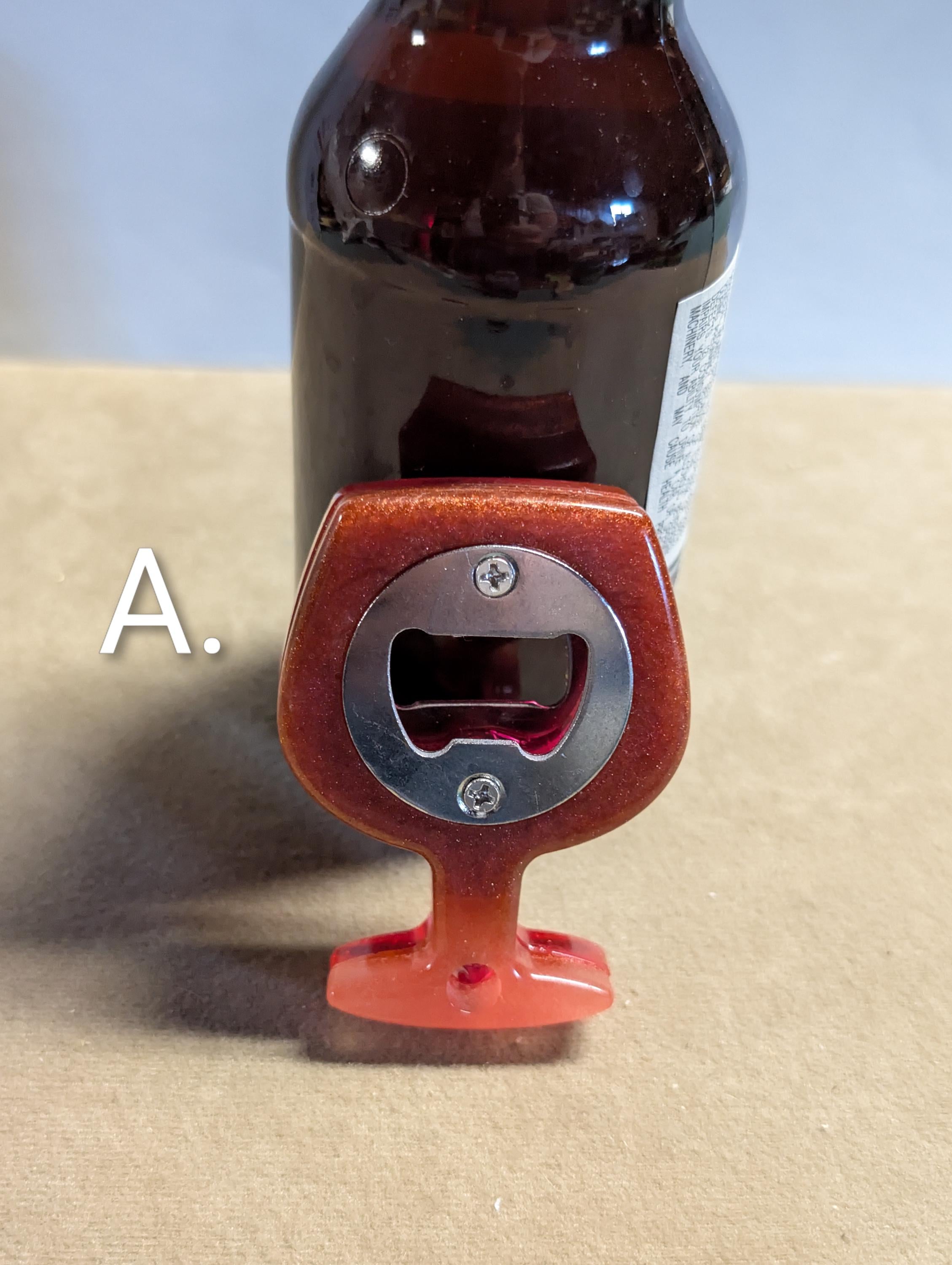 Wine glass shaped bottle opener. Many colors available.