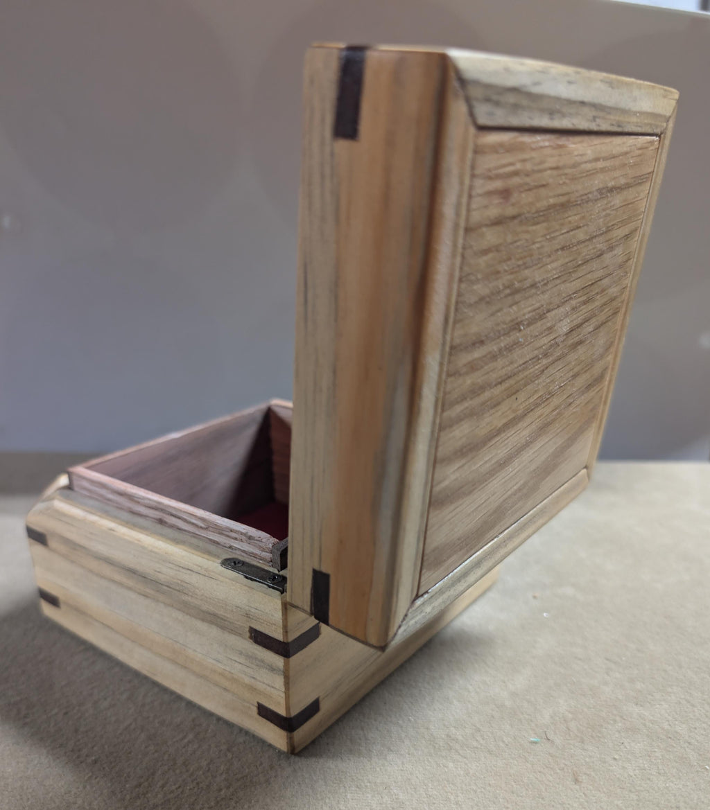 Hand crafted small jewelry or keepsake box.  poplar, oak, and walnut with red velvet Lining