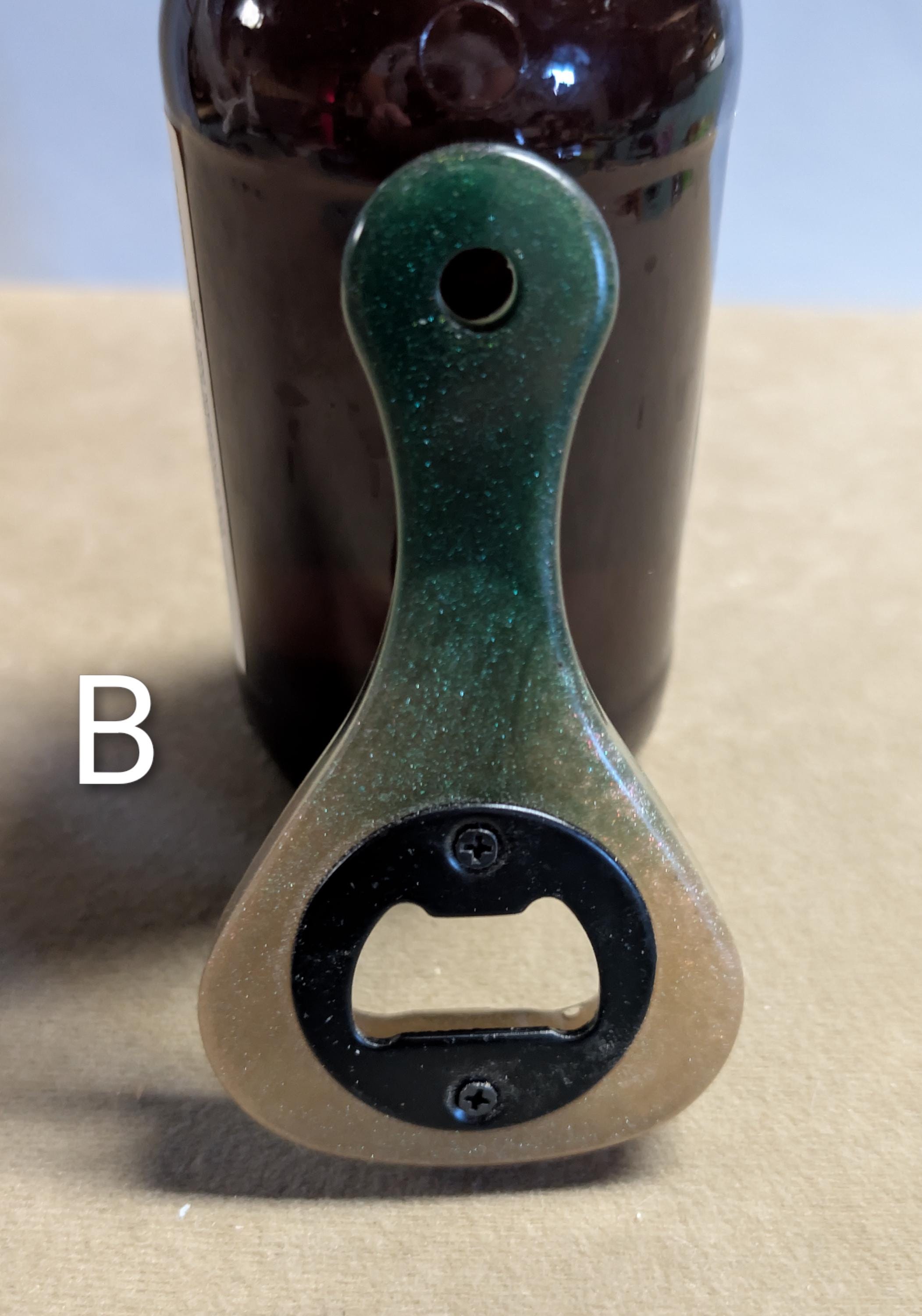 Paddle shaped bottle opener. Orange in color. Many other colors also available