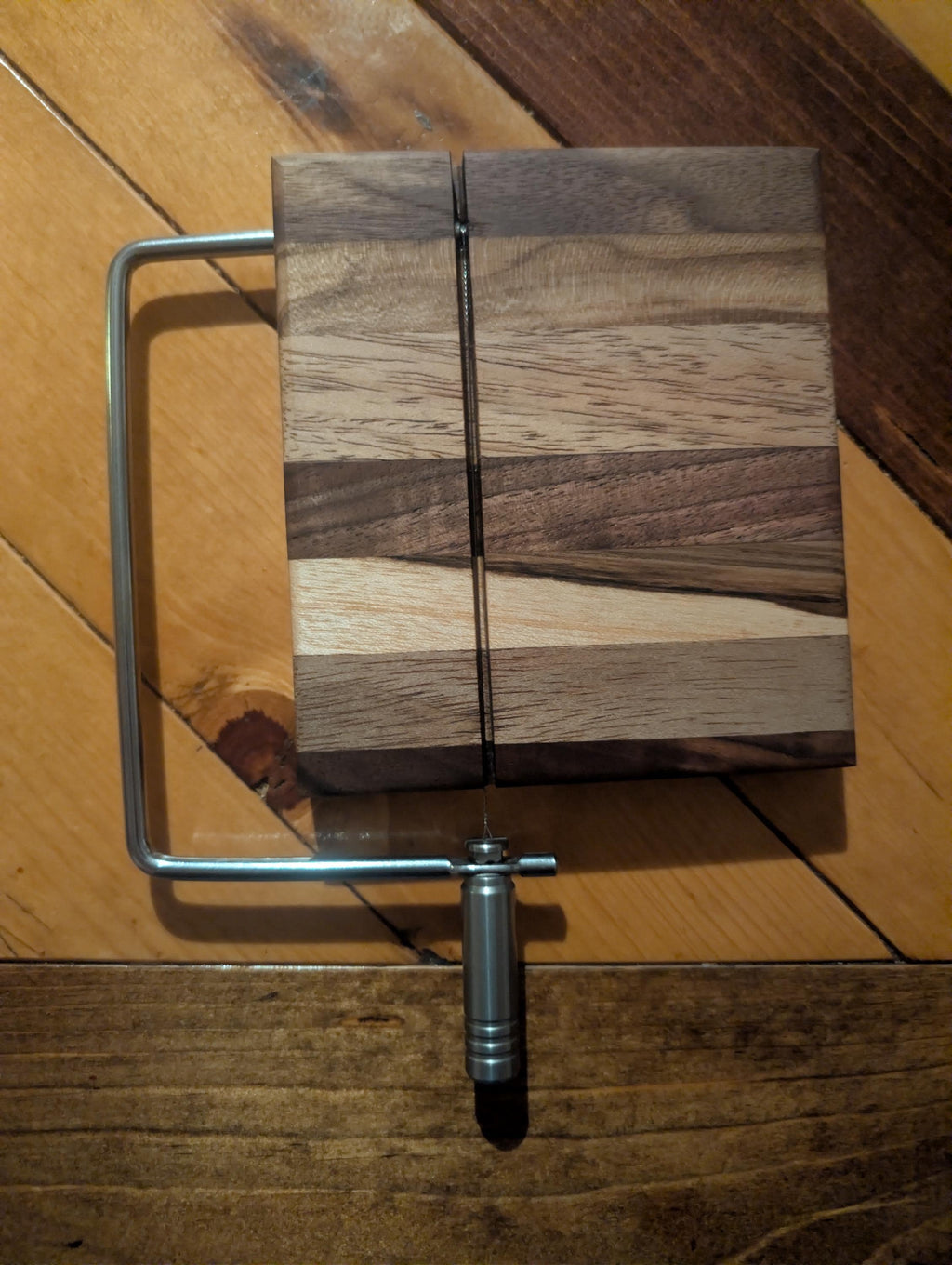 Farmhouse style cheese cutter made of exotic wood