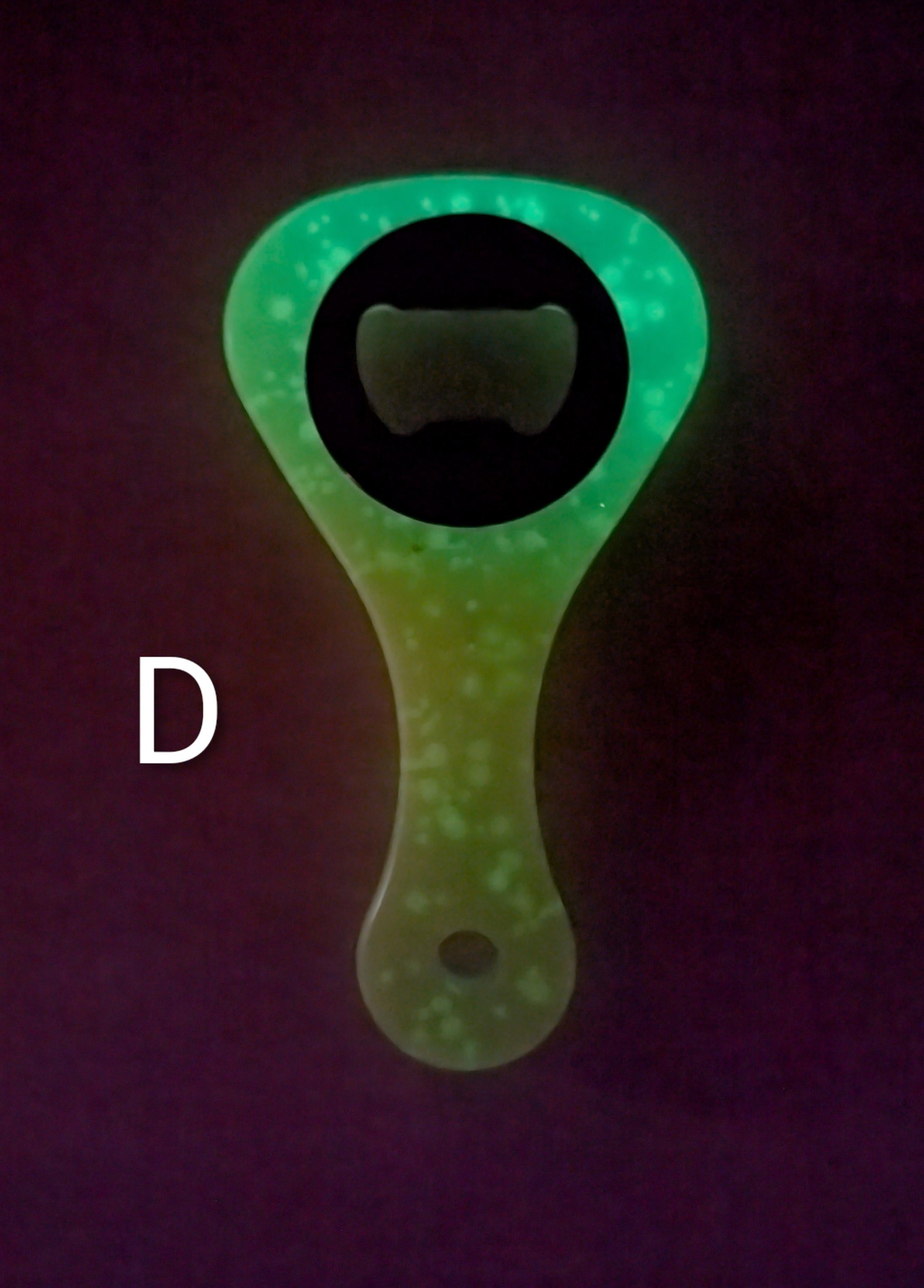 Paddle shaped bottle opener. Orange in color. Many other colors also available