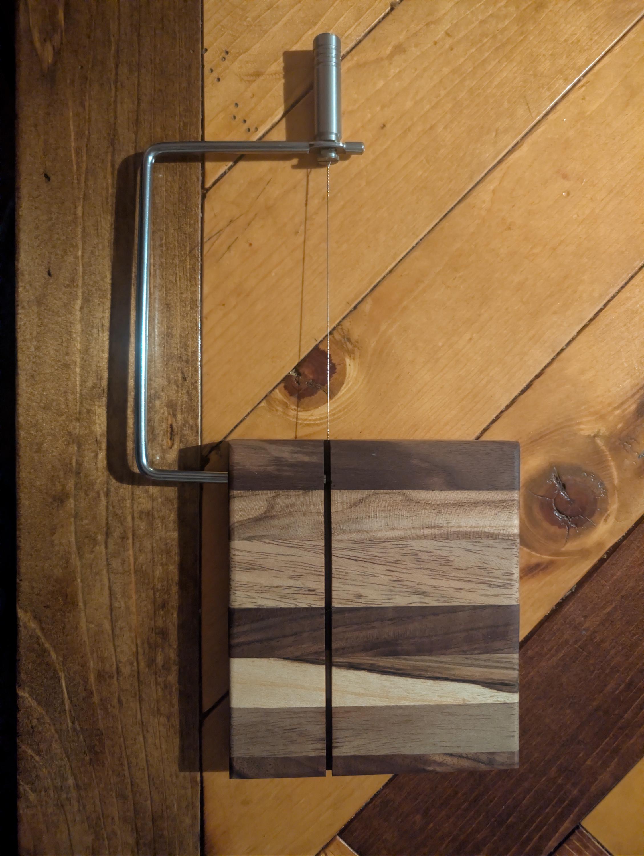 Farmhouse style cheese cutter made of exotic wood