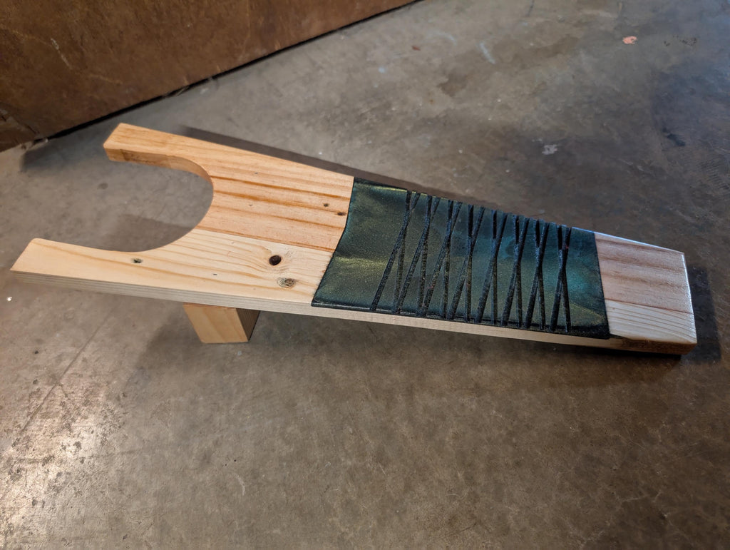 Rustic handcrafted boot jack. Hand crafted from natural wood with inlay, and stained to desire.