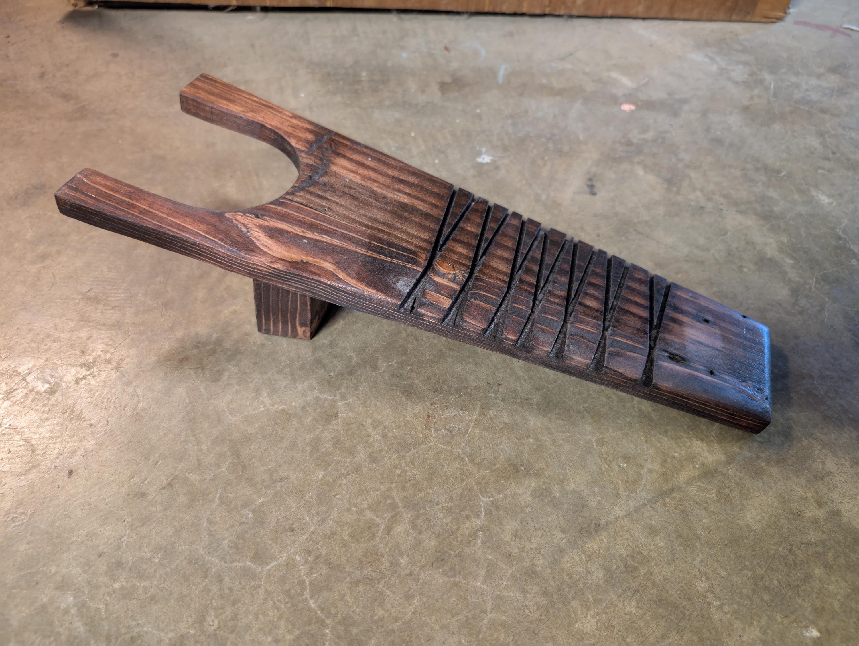 Rustic handcrafted boot jack. Hand crafted from natural wood, and stained to desire.