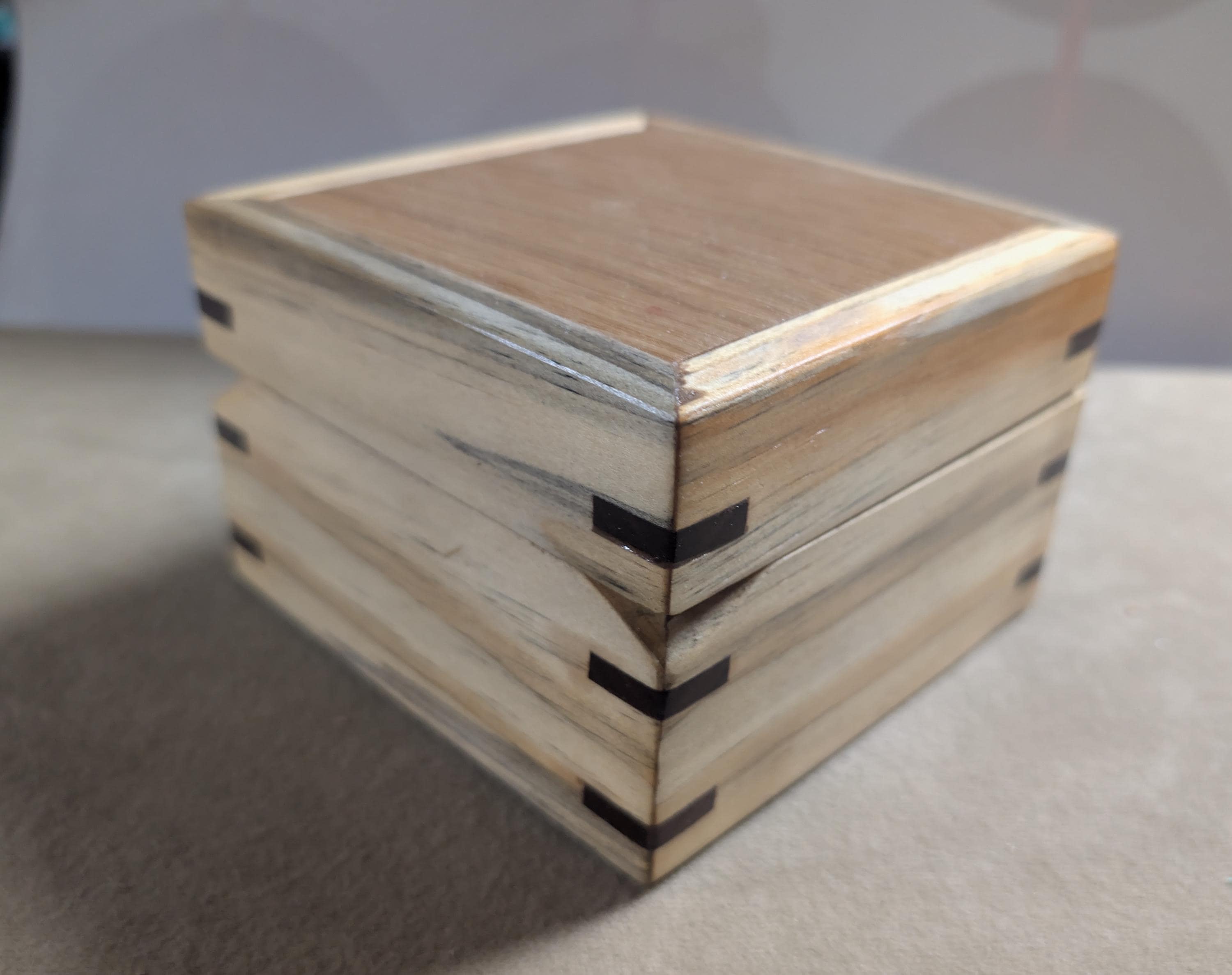 Hand crafted small jewelry or keepsake box.  poplar, oak, and walnut with red velvet Lining