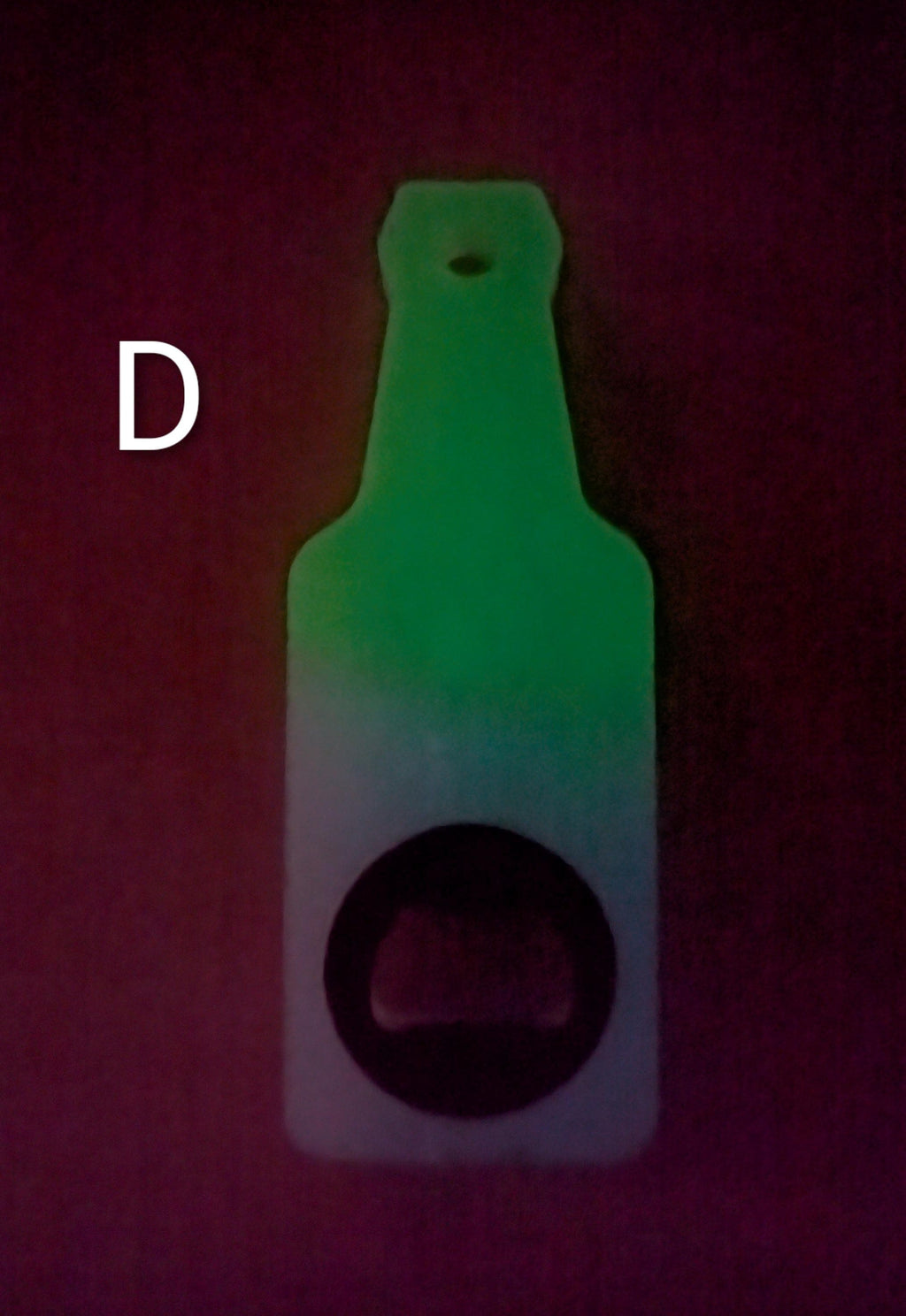 Bottle shaped bottle opener.  Many color options available with a magnet option on the back for hanging.