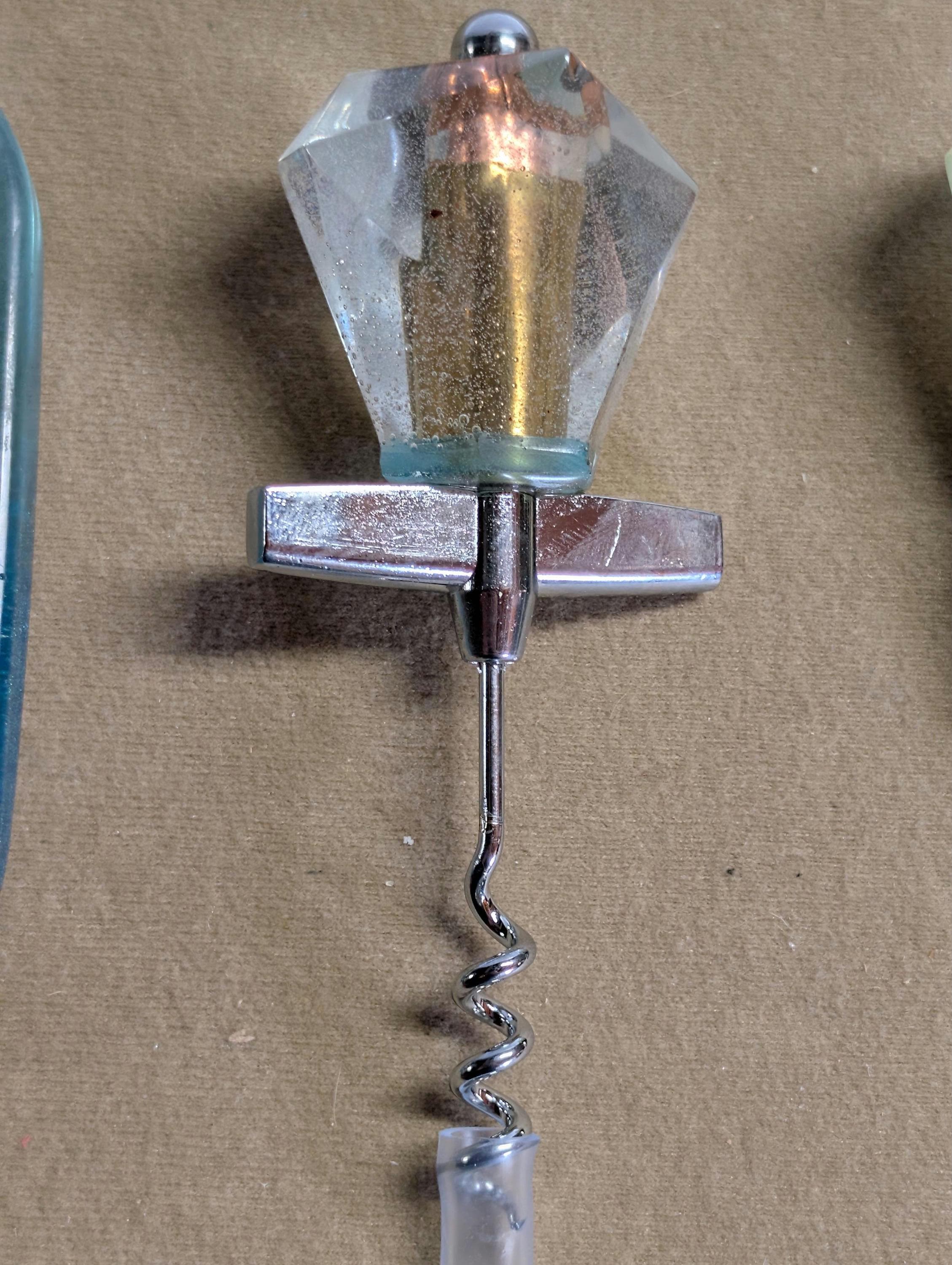 Bar bullet bundle. Bottle opener, corkscrew, and wine stopper.