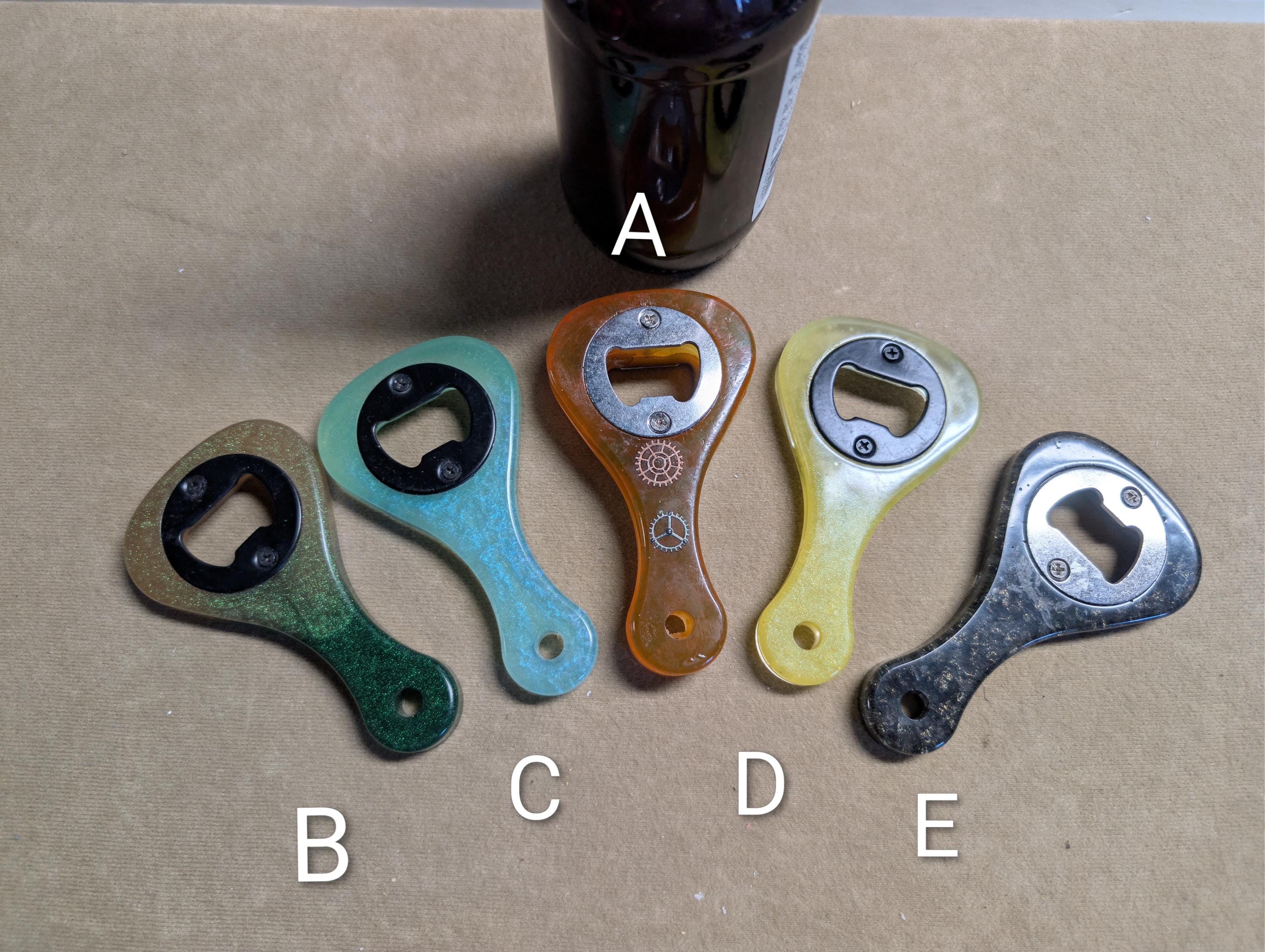 Paddle shaped bottle opener. Orange in color. Many other colors also available