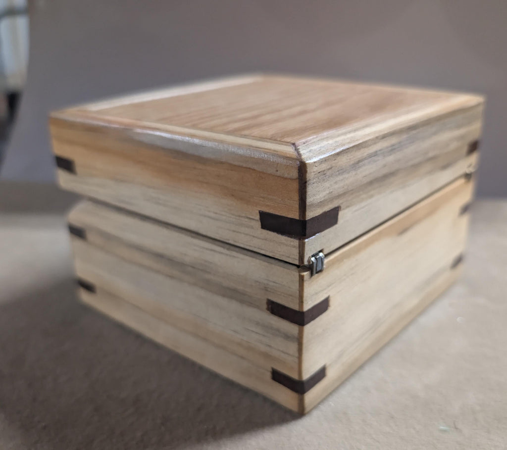 Hand crafted small jewelry or keepsake box.  poplar, oak, and walnut with red velvet Lining