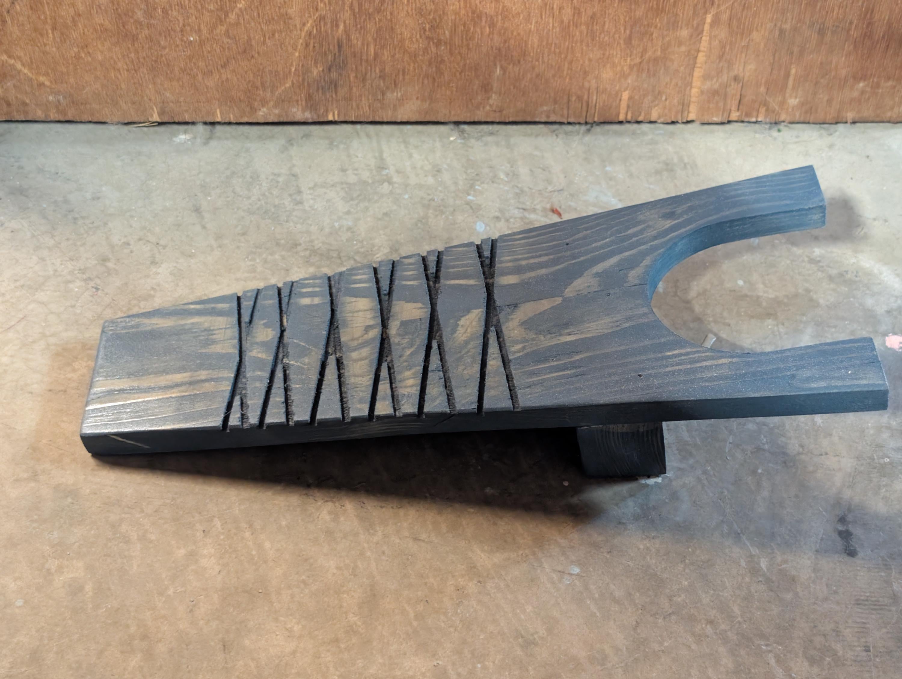 Rustic handcrafted boot jack. Hand crafted from natural wood, and stained to desire.