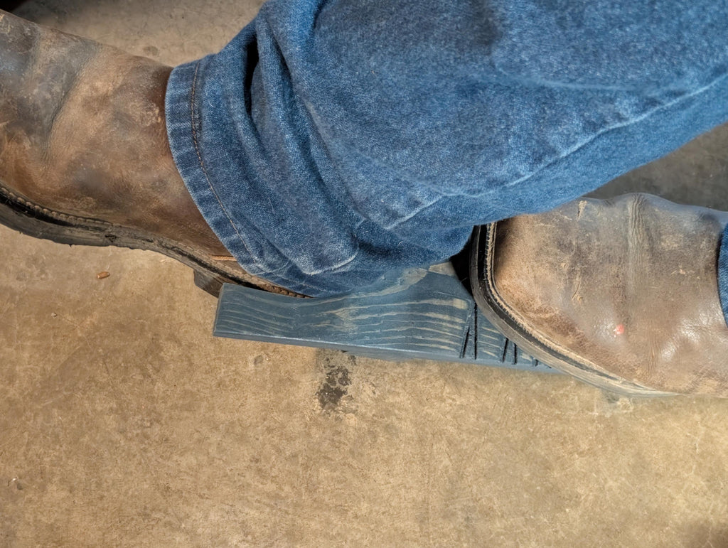 Rustic handcrafted boot jack. Hand crafted from natural wood, and stained to desire.