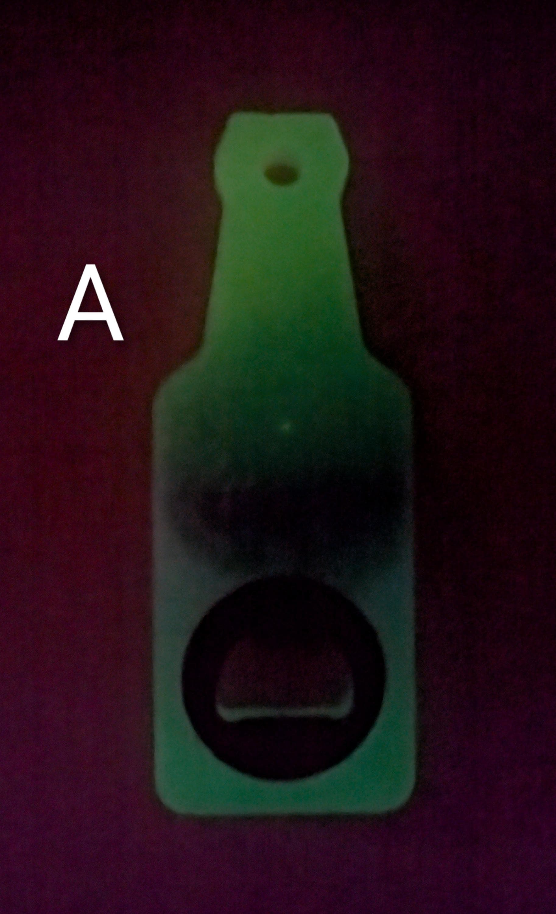 Bottle shaped bottle opener.  Many color options available with a magnet option on the back for hanging.