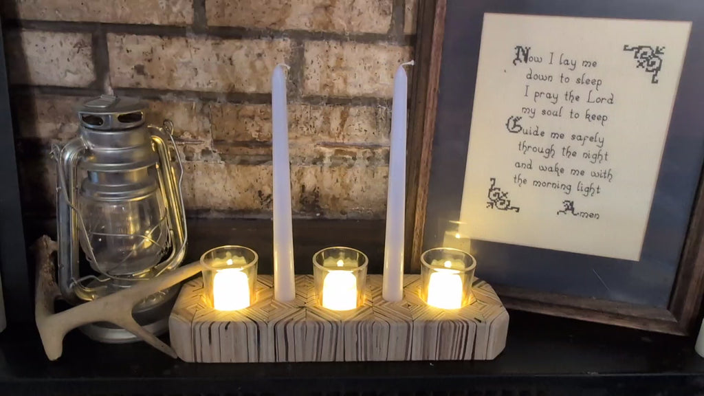 Hand crafted wooden candle holder, holds 3 votive candles and 2 candle sticks.