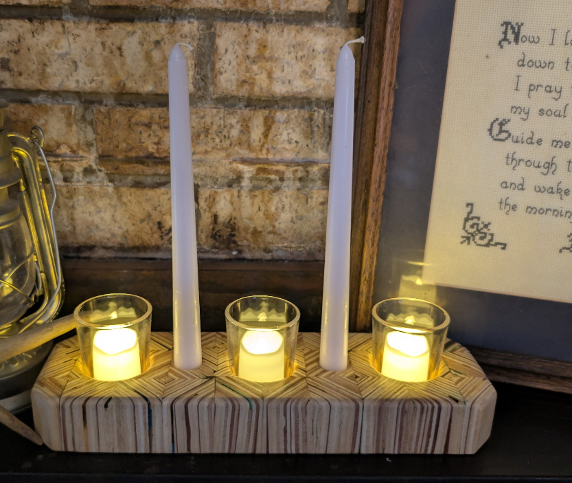 Hand crafted wooden candle holder, holds 3 votive candles and 2 candle sticks.
