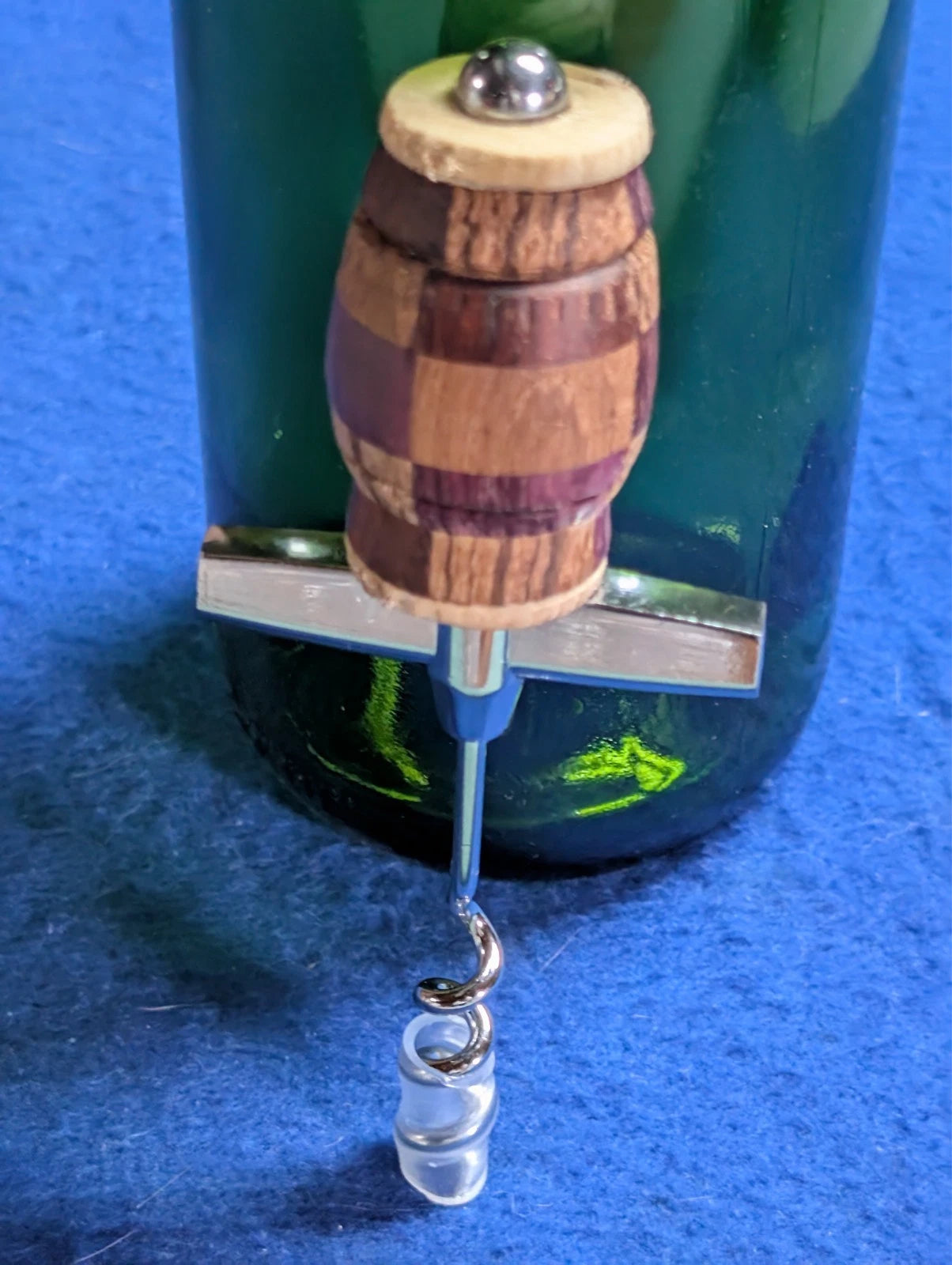 hand crafted corkscrew with wooden handle great addition for kitchen or bar.