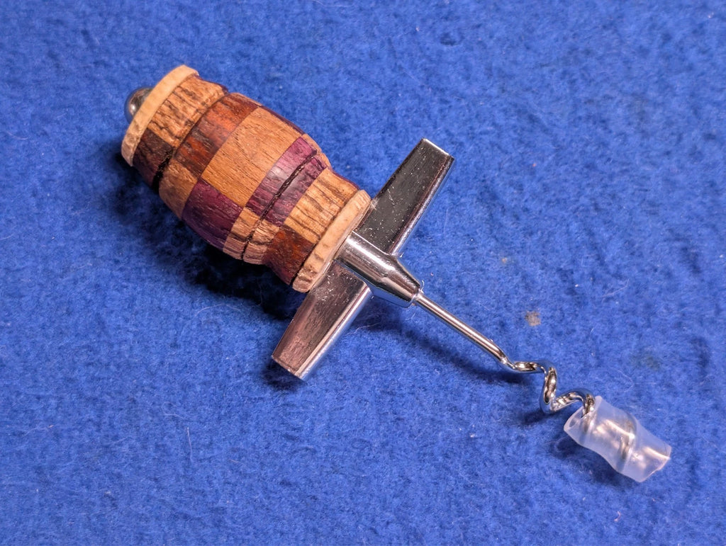 hand crafted corkscrew with wooden handle great addition for kitchen or bar.