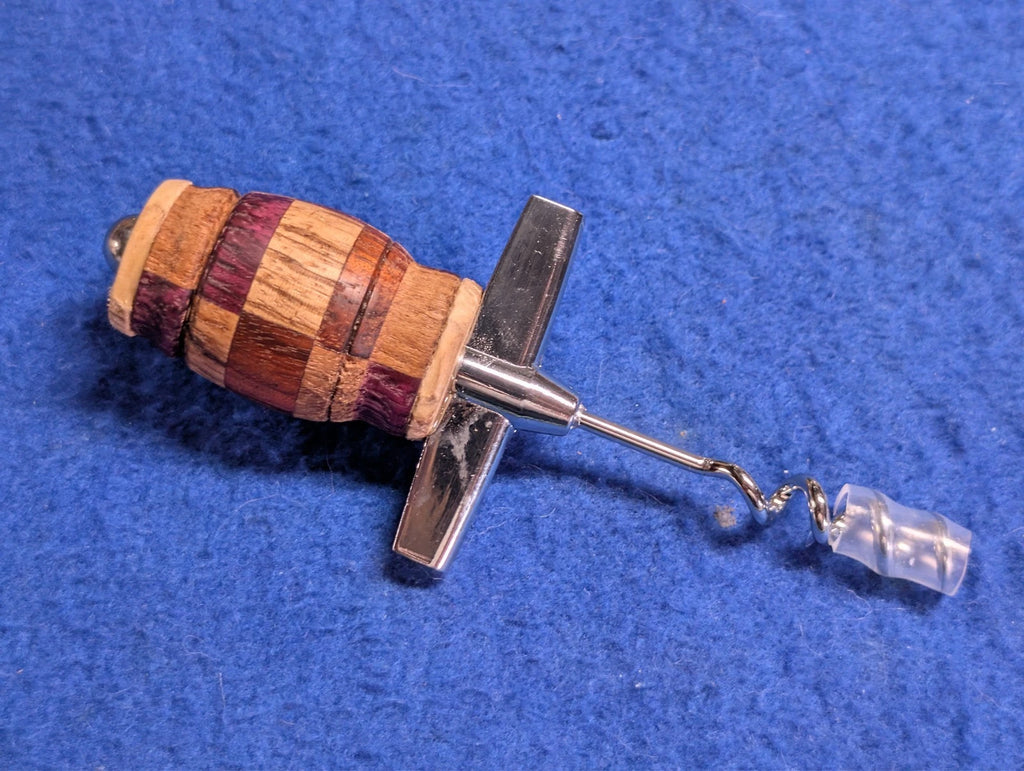 hand crafted corkscrew with wooden handle great addition for kitchen or bar.